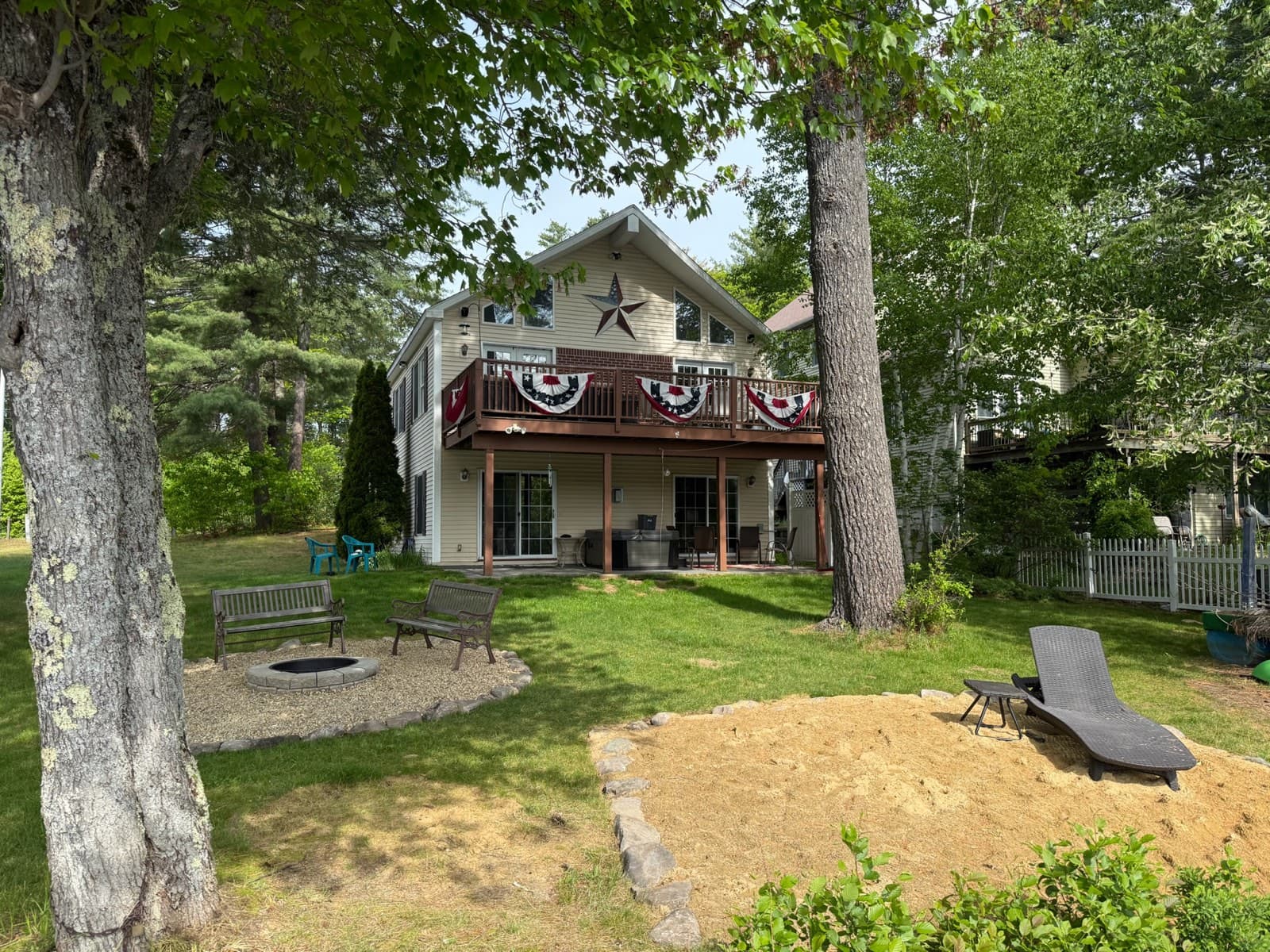 The lodge exterior with the waterfront and dock in view